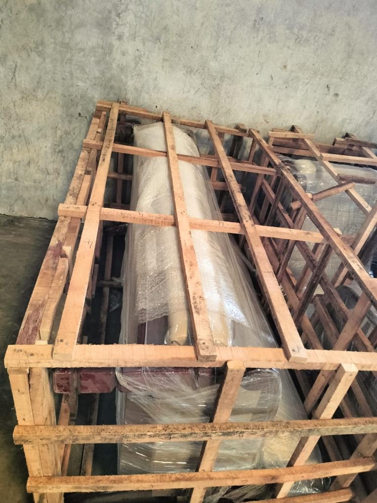 Wrapped roller packed in a timber crate